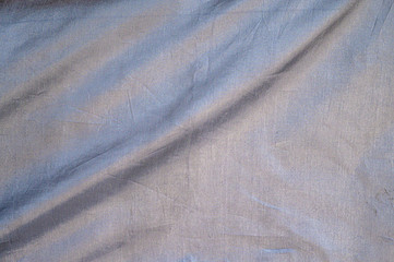 Dark grey canvas fabric texture.