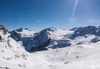 Naklejka premium Fantastic view at the arrival of the cableway Presena to the glacier Adamello, Lobbie, Presanella and Pian di Neve