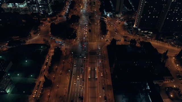 Night aerial shot of busy city traffic life