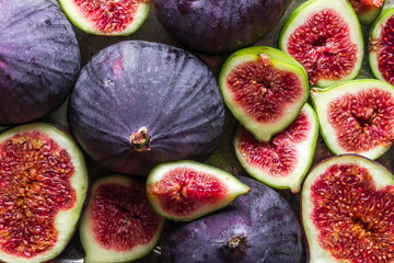 Background of figs. Fresh, juicy ripe fig fruits slices. - 287884484