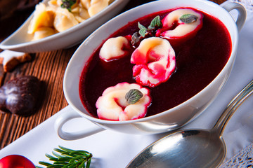traditional Polish Christmas Eve borscht with dumplings