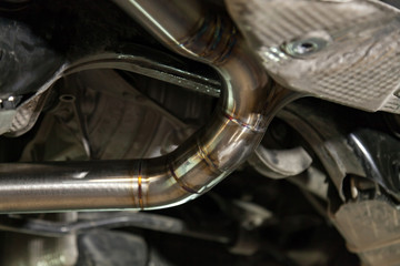 Fabrication and installation of a stainless steel car exhaust pipe with a bifurcation and a louder...