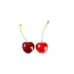 Fresh cherries on white background. Juicy summer berry close-up.