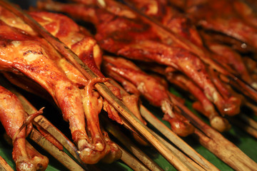 Closeup of grilled chicken show for selling.