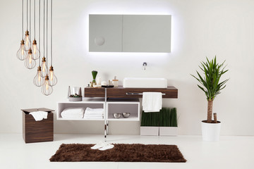 Fototapeta premium brown cupboard designed clean bathroom decorative lamp