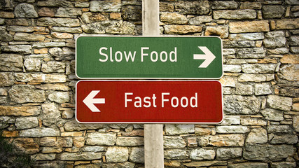 Street Sign Slow versus Fast Food