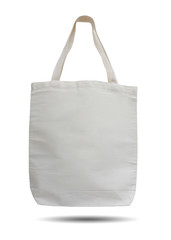 Calico bag reduce the use of plastic bags, the concept of releasing global warming. Isolated on white background this has clipping path.      - obrazy, fototapety, plakaty