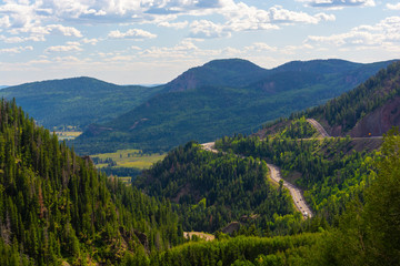 Fototapeta na wymiar Wolf Creek Pass Highway 160 Mountain Switchbacks in Colorado on a Sunny Day