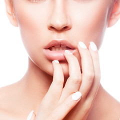 Obraz na płótnie Canvas Lips, part of beauty face, hand near sensual lips of perfect skin, natural make-up. Skincare facial treatment concept