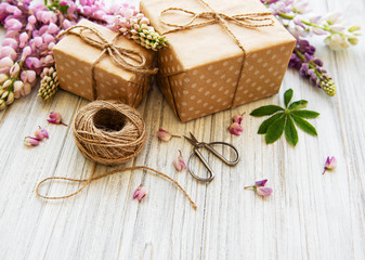 Lupine flowers and gift boxes