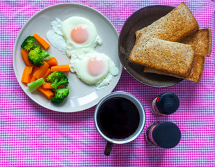 breakfast with fried eggs and coffee
