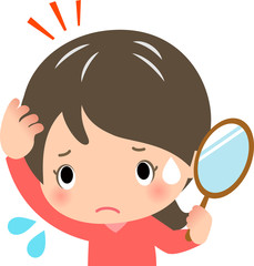 白髪を気にする若い女性