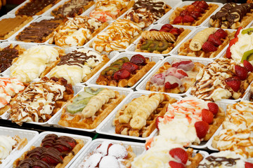 Belgian traditional waffles could have a lot of different taste, with fruit, cream, syrup , chocolate and many more delicious dessert