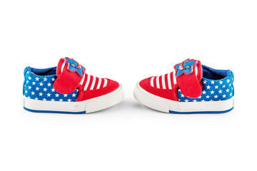 The blue and red children's sports shoes isolated on a white background