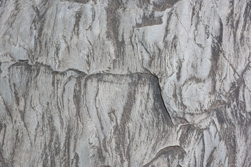 Natural colored rock crack texture closeup