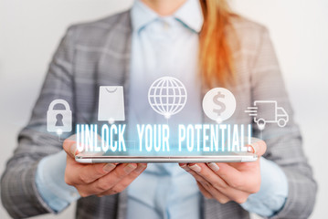Handwriting text writing Unlock Your Potential. Conceptual photo release possibilities Education and good training is key Modern technology tech loock Lady front presenting hands blue glow copy space