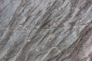 Natural colored rock crack texture closeup