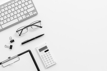 Minimalistic white office desk flat lay copy space top view