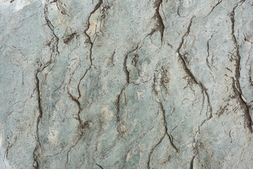 Natural colored rock crack texture closeup