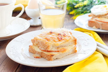 Breakfast with french cheese and ham croc monsieur sandwich, horizontal