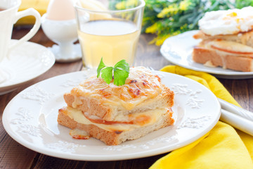 Breakfast with french cheese and ham croc monsieur sandwich, horizontal