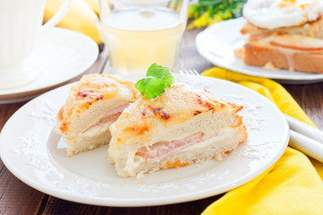 Breakfast with french cheese and ham croc monsieur sandwich, horizontal