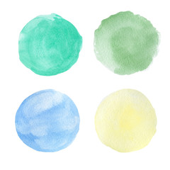 set of emerald, blue, yellow, green pastel watercolor texture circles isolated on a white background
