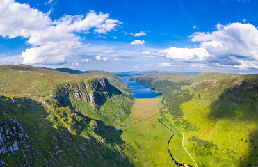 Aerial view of the Glenveagh National Park with castle Castle and Loch in the background - County Donegal, Ireland - obrazy, fototapety, plakaty