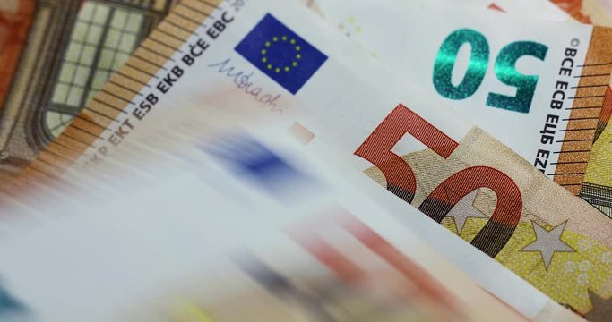 counting 50 euro money banknotes closeup
