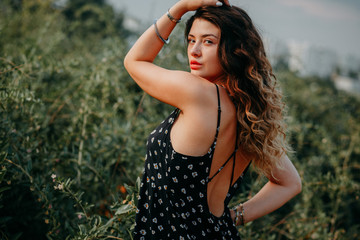 Naklejka premium Young girl in summer time full of joy and harmony