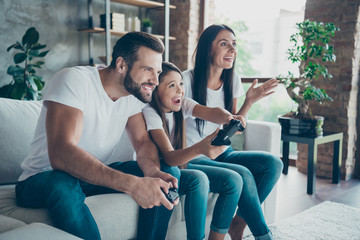 Profile side view of nice attractive lovely cheerful cheery family wearing casual white t-shirts...