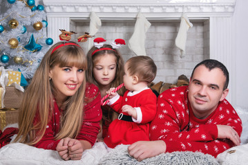 Merry Christmas and Happy Holidays! Xmas Christmas photo of surprised happy family