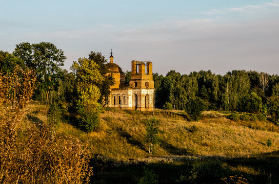 Church Of St. Nicholas The Miracle Worker Bryansk Region, The Village Of Eliseevichi. Ruined Church On A Hill At Sunset.