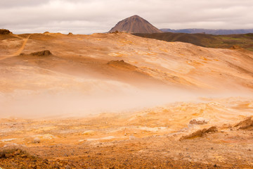 Fototapeta na wymiar Namafjall Hverir geothermal area in North Iceland. Sulfur fields near of Mývatn lake, Iceland, Europe.
