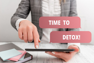 Writing note showing Time To Detox. Business concept for when you purify your body of toxins or stop consuming drug Business concept with mobile phone in the hand