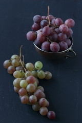 Grape fruits on a black background
