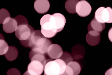 Pink color abstract bokeh. Christmas blurred background