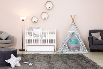 Interior of stylish children's room with baby bed © Pixel-Shot