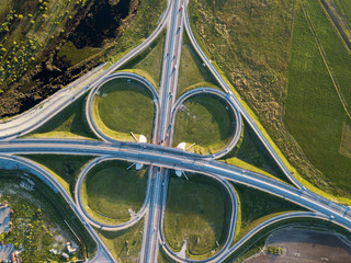 Summer aerial photo of transport junction, traffic cross road junction day view from above