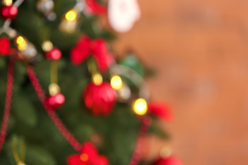 Fototapeta na wymiar Blurred view of beautiful Christmas tree, closeup