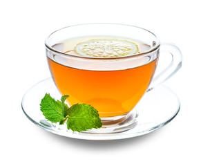 Glass cup of tasty tea with mint and lemon on white background