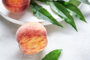 Tasty peach on light table