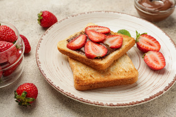 Plate with tasty sandwich on table