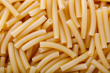 Pasta texture background. Pasta is a staple food of traditional Italian cuisine. IItalian food...