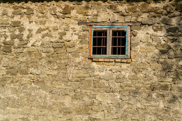 Window in the old stone wall