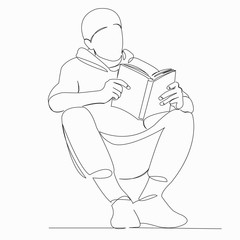 teenager reads a book