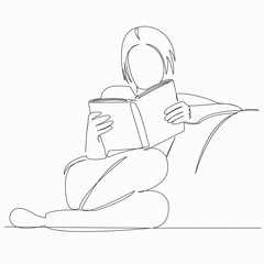 woman girl housewife reading a book on the couch