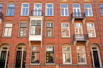 Fototapeta na wymiar Colorful heritage buildings, located on Van Eeghenstraat street next to Vondelpark, Amsterdam, Netherlands