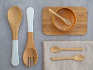 Top view set of Eco friendly wooden and bamboo cutlery. Plastic free and zero waste concept
