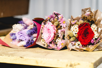 dried flowers bouquet of roses under the sun